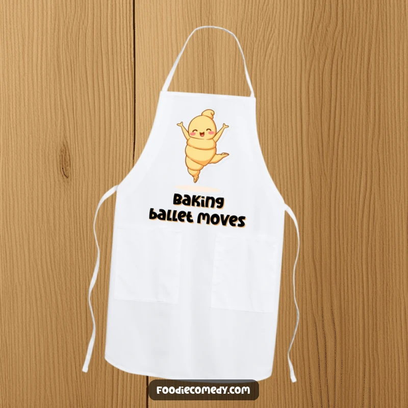 Funny croissant character doing a ballet leap on an apron, blending kitchen functionality with graceful humor.