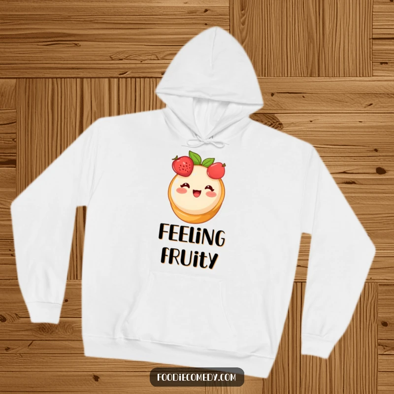 Funny fruit tart hoodie, a cute dessert character blushing with delight, offering cozy and sweet comfort.