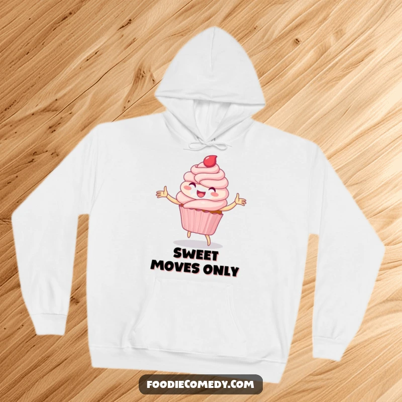 Funny hoodie with a delighted cupcake performing a whimsical folk dance, showcasing infectious sugary enthusiasm.